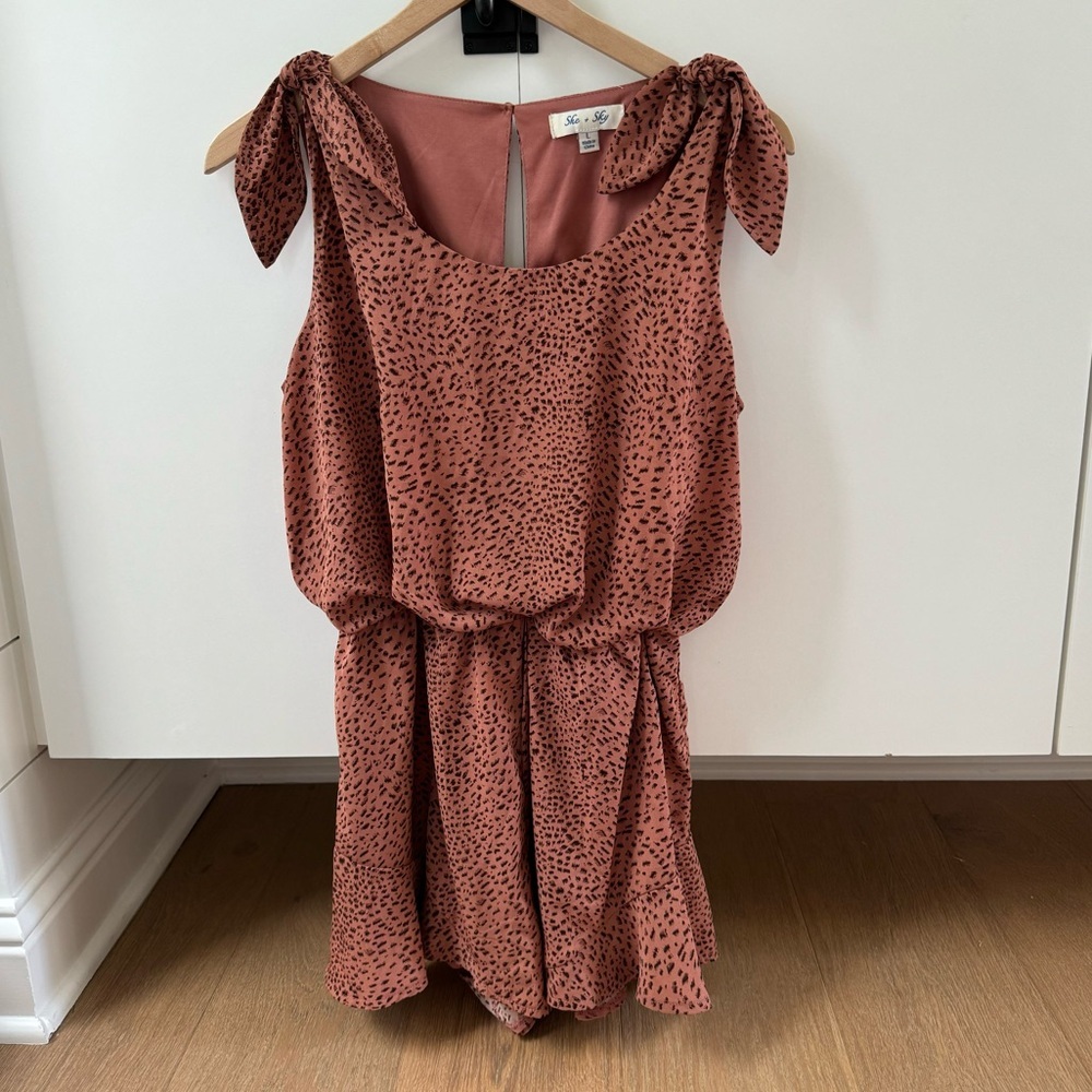 Adorable animal print romper size Large